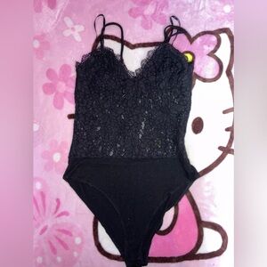 Black lacey body suit